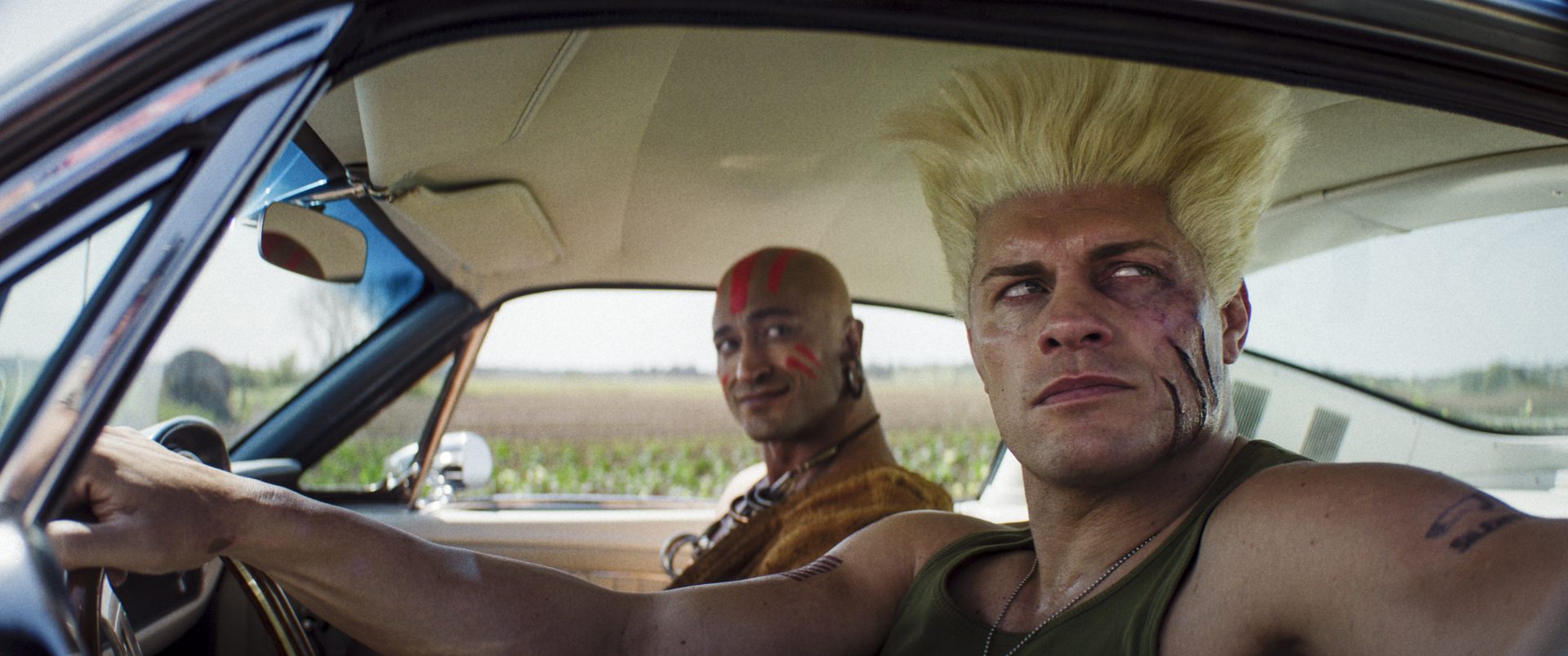 Guile al volante con Dhalsim de copiloto en Street Fighter